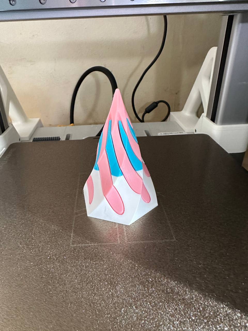 white, blue and pink cone in two pieces