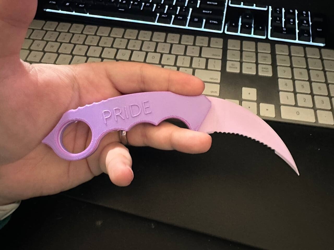 purple karambit curved knife fidget toy